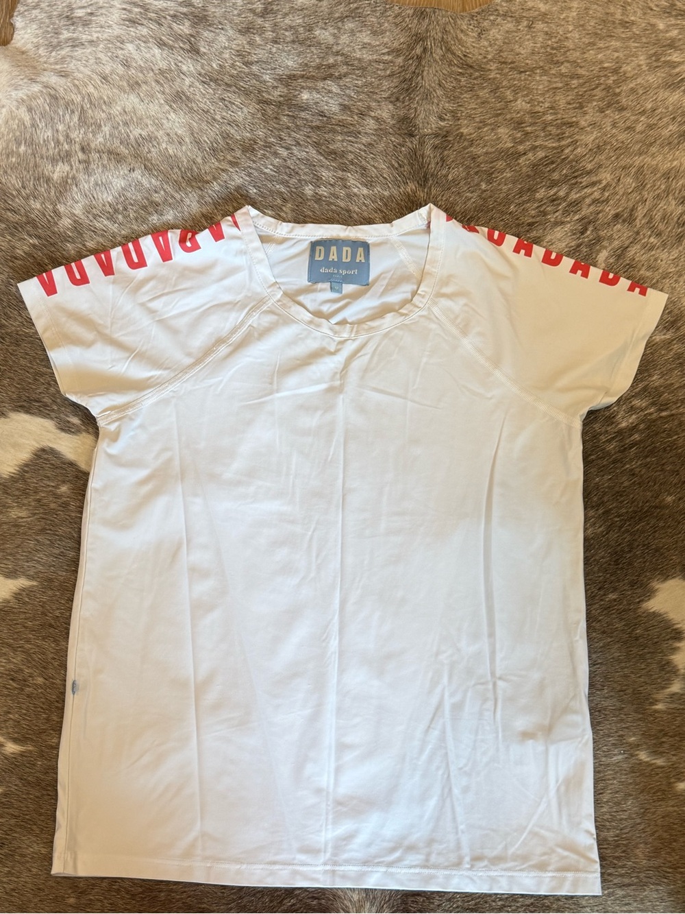 Dada Sport White Short-Sleeve schooling shirt with orange Shoulder Logo